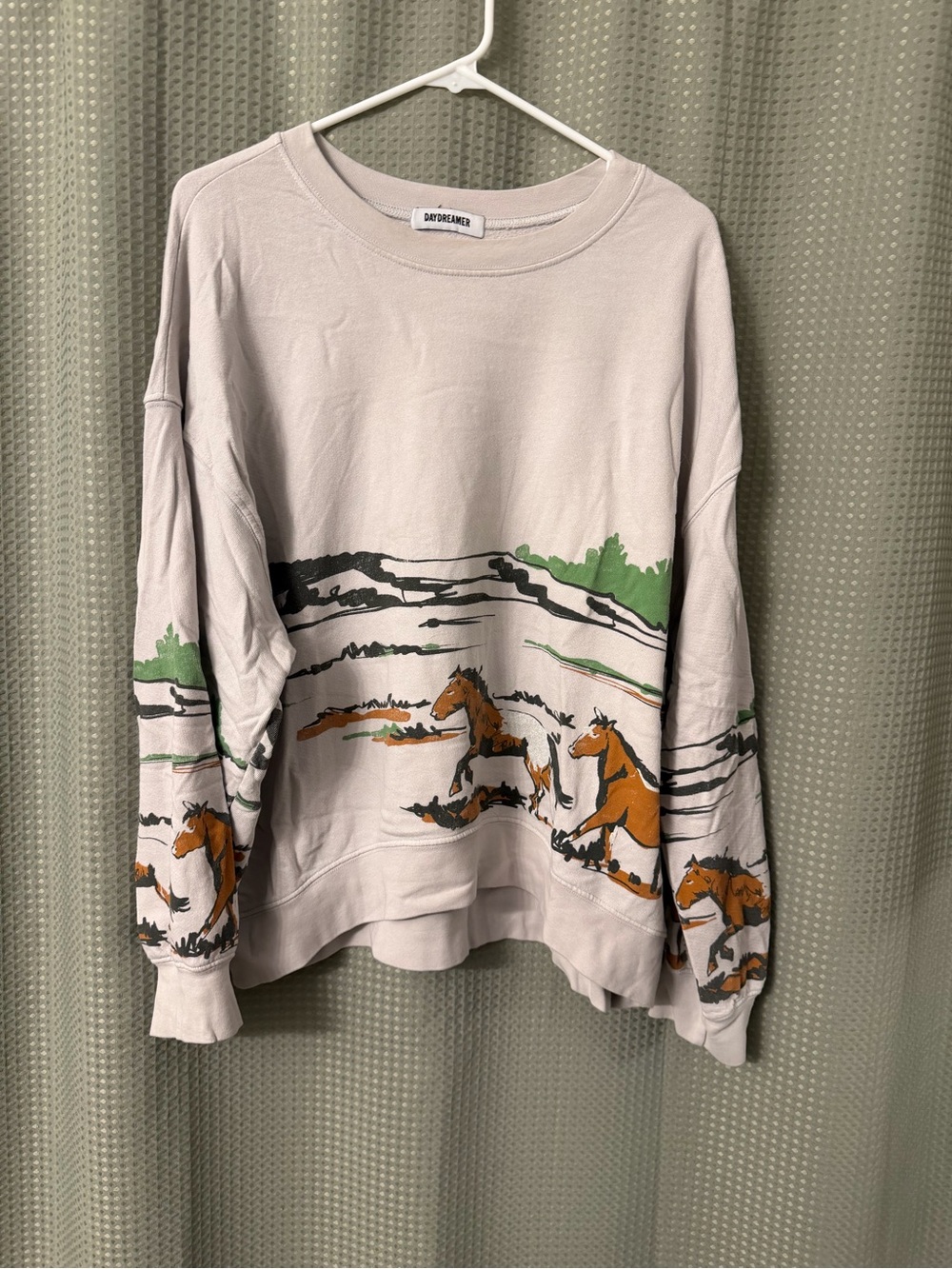 Daydreamer Cream Crewneck Sweatshirt with Brown Horse Graphics and Green Accents
